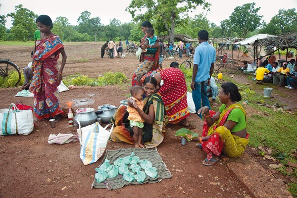 IN GOOD CHEER Haandiya (local wine) market in Kalinganagar, close to the Tata site. The general state of cheer among local folk here is in stark contrast to the mood among people affected by Posco�s project