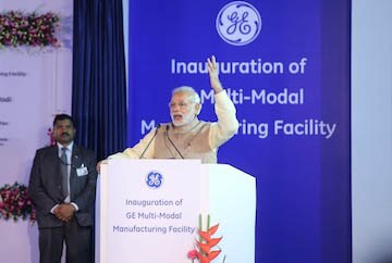 Make ships in India, Modi urges GE