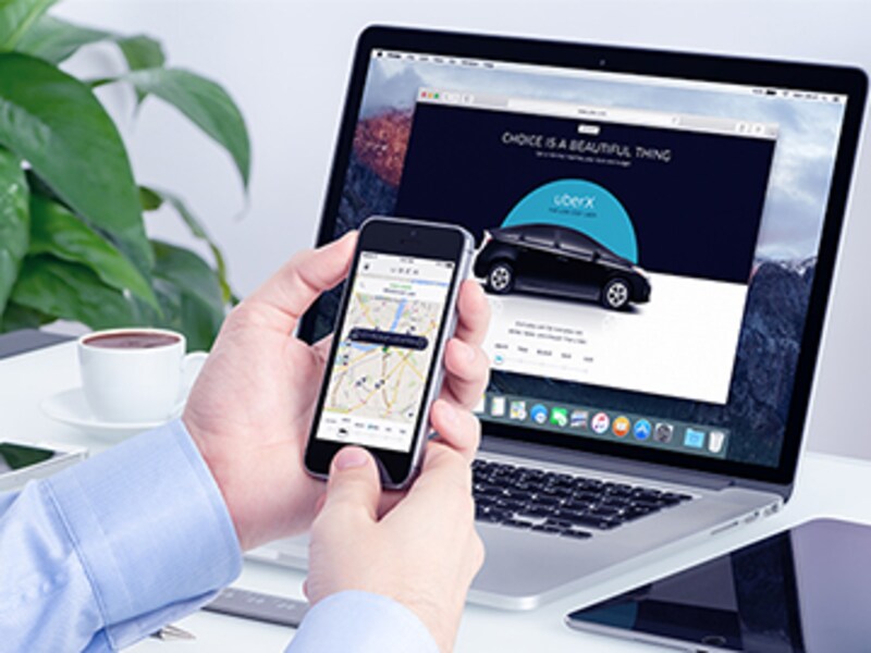 Ola-Uber taxi war in India intensifies into test of 'local' versus 'global'