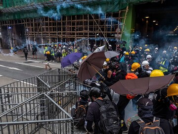 Alibaba postpones Hong Kong listing as protests roil markets