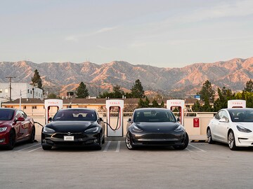 Tesla Model 3 sales surge, lifting its bottom line