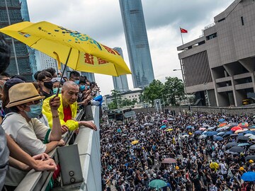 As protesters fill Hong Kong's streets, businesses are alarmed too