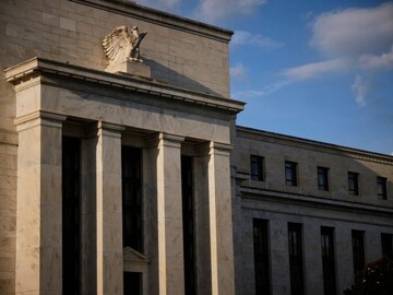 US Fed cuts rates again as economic risks rise