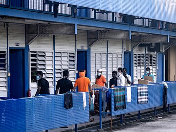Packed with migrant workers, dormitories fuel coronavirus in Singapore