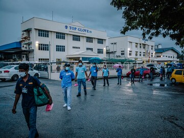 A company made gloves for the world. Now its workers have the virus