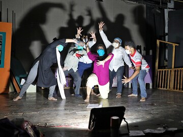 Photo of the Day: Lights, Masks, Action