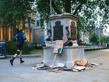 Britain grapples with its racist past, from town square to board rooms