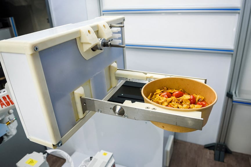 Kitchen robot in Riga, Latvia cooks up new future for fast food