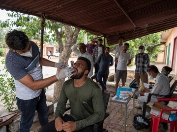 Covid-19 strategy divides India's villages, vaccine hesitancy unites them