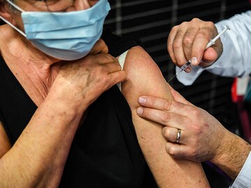 Plan to ditch the mask after vaccination? Not so fast