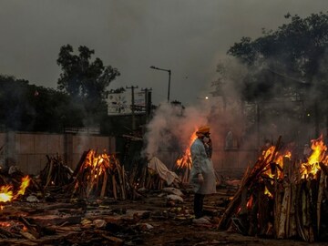 At India's funeral pyres, Covid-19 sunders the rites of grief