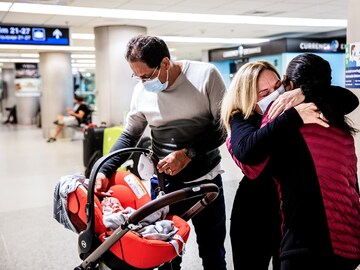 US travel ban ends, easing personal frustrations and diplomatic tension