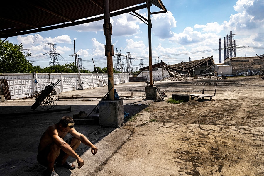 Serhiy Sokol’s wheat and barley farm, where buildings were destroyed by Russian rockets, near the town of Zelenodilsk, Ukraine on July 28, 2022. Sokol said he and his farmhands plucked dozens of aluminum tubes from Russian rockets from the black earth as they worked his fields. (David Guttenfelder/The New York Times)