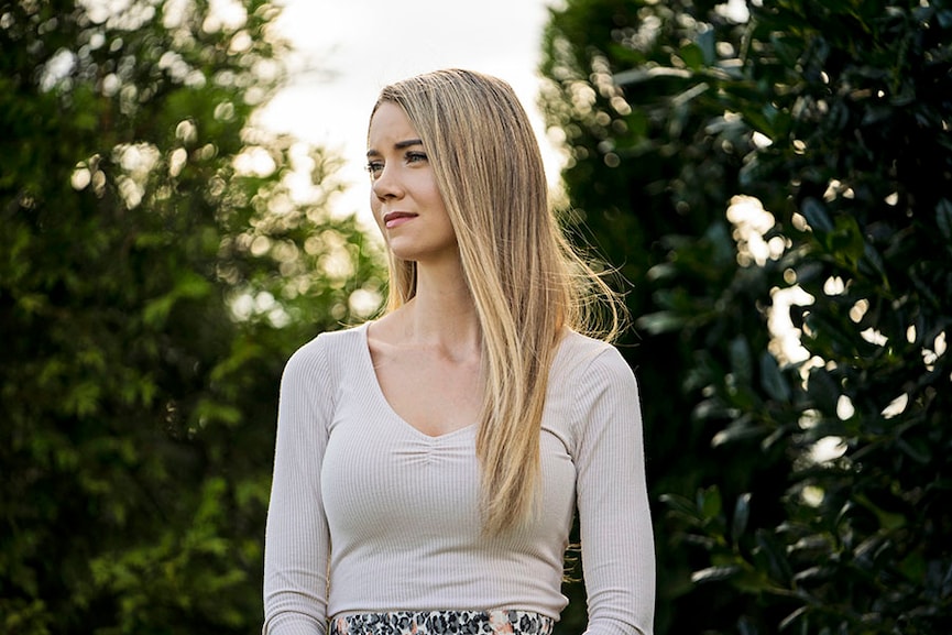 Twitch streamer DizzyKitten at her home in Bentonville, Ark., on June 26, 2022. DizzyKitten, whose first name is Brandi, learned that the police wouldn’t act on her report of a stalker until he had shown up at her home. (Nick Oxford/The New York Times)