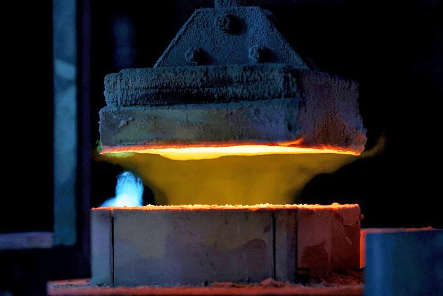 A gas-fired oven is pictured on the production line at the German glass producer Heinz-Glas Group in Kleintettau, Germany on August 3, 2022. Image: Ronny Hartmann / AFP 