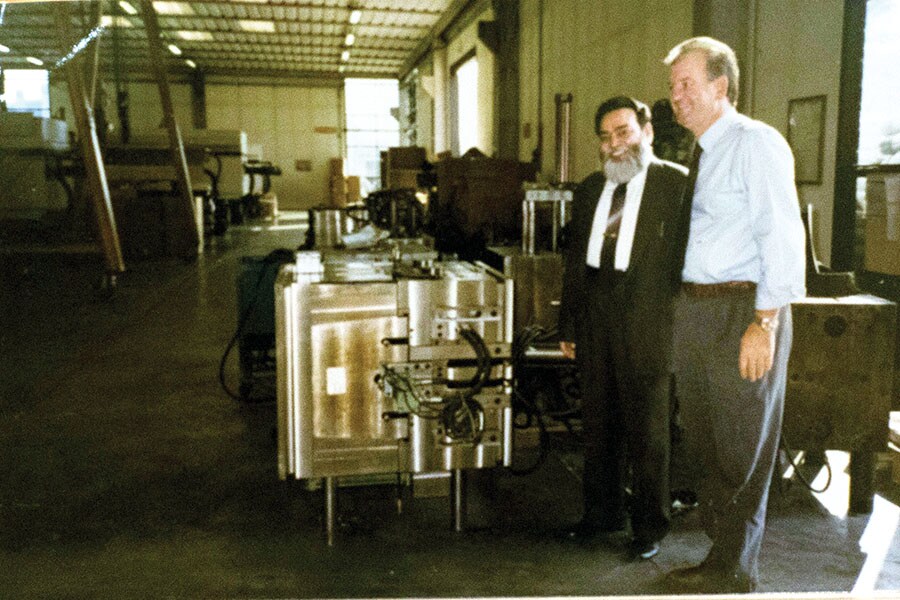 Subhash Kapur (left) at the Bieffe factory in Italy in 1995