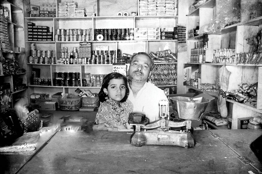 Shammi Agarwal’s grandfather inside their grocery store in the 1980s