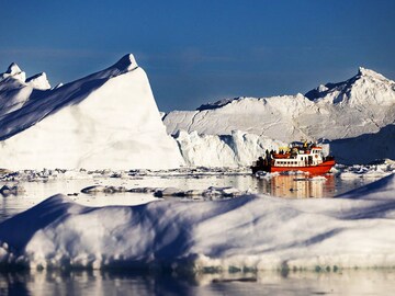 Greenland treads softly on tourism as icebergs melt