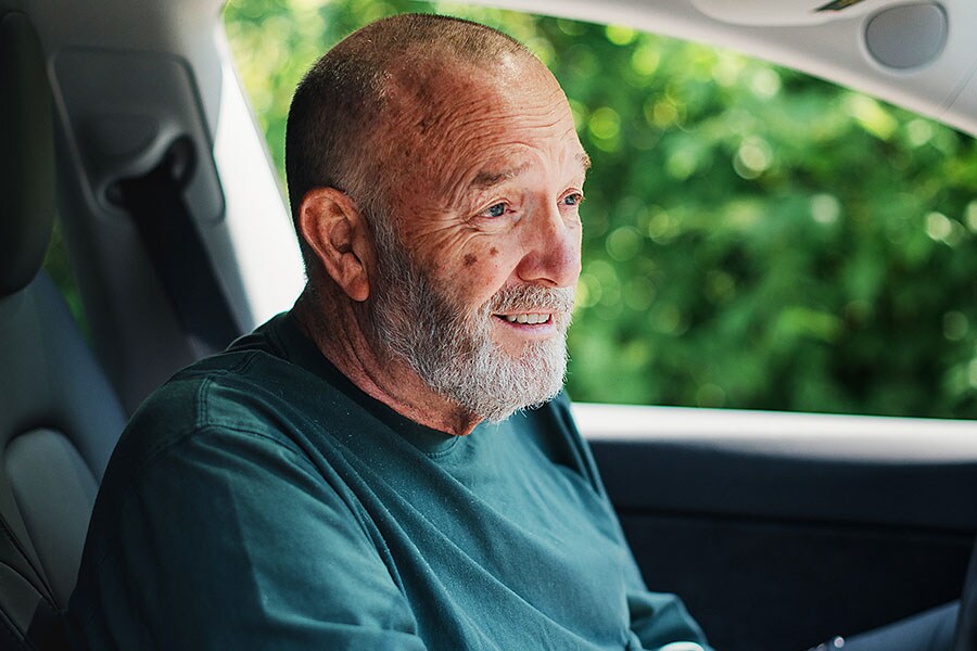 The attorney Mike Nelson sits in his Tesla in Kingsley, Pa., June 15, 2022. Nelson recently founded the start-up QuantivRisk, which aims to collect driving data from Tesla and other carmakers before analyzing it and selling the results to police departments, insurance companies, law offices and research labs. (Hannah Yoon/The New York Times)