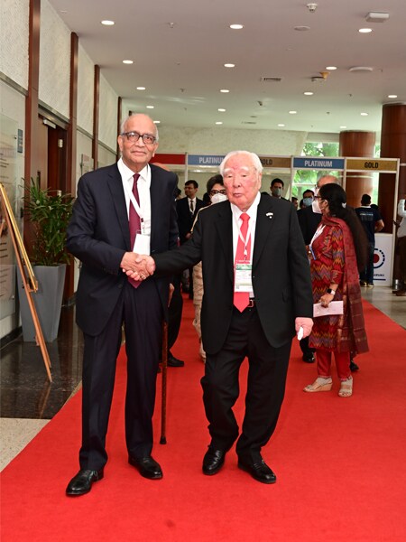 RC Bhargava, chairman, Maruti Suzuki India and Osamu Suzuki, CEO, Suzuki Motor Corp. during the foundation stone laying ceremony of Suzuki EV battery plant and Maruti Suzuki vehicle manufacturing facility, in Gandhinagar. Image: PIB