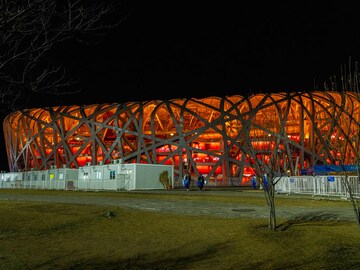 Hosting the Olympics is costly. For China, it's worth every billion