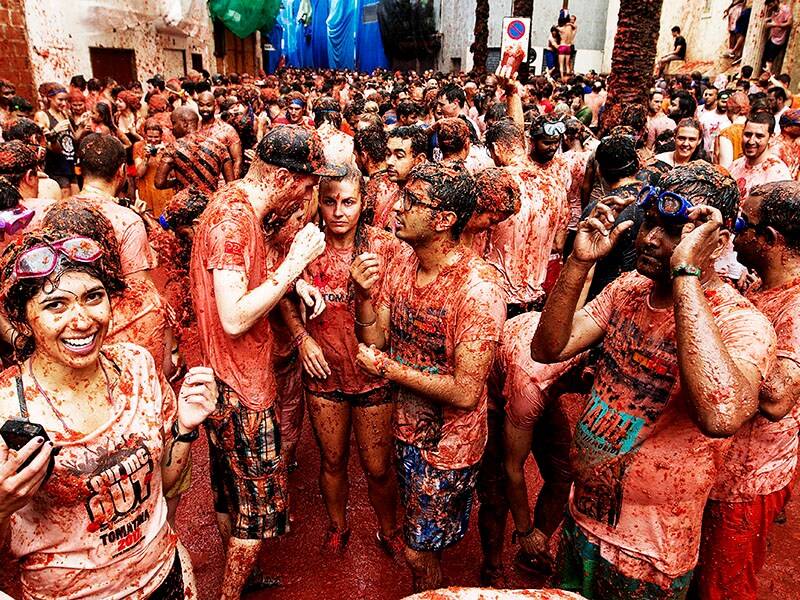 From tomato tossing to playing piggy: Europe's weirder summer festivals