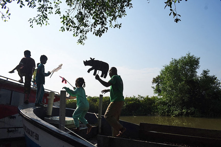 Indonesian uses puppets to teach about threats to the world's rarest rhinos