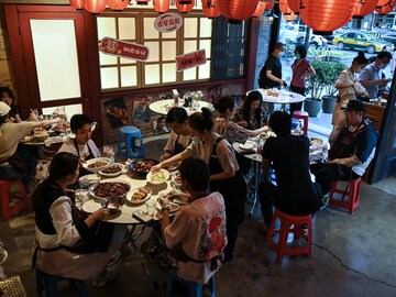 Relief, caution in Beijing as city lifts Covid dine-in curbs