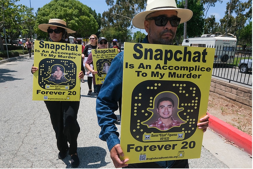 People participating in a rally over drug deals on Snapchat. 