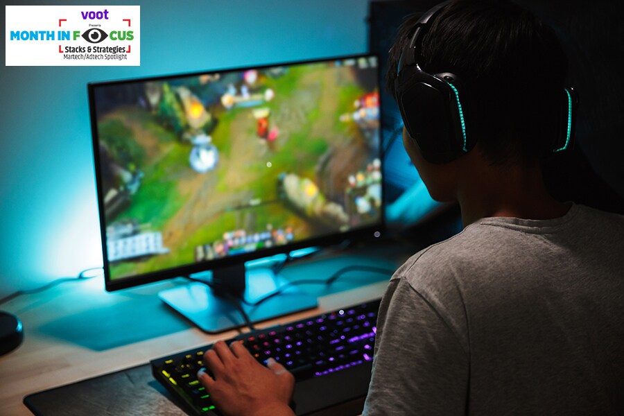 It is an image of a person playing a video game on their PC. More and more gaming companies in India are acquiring adtech firms or building capabilities to get hold of first-party data and offer better ROI to advertisers. Here's how it works