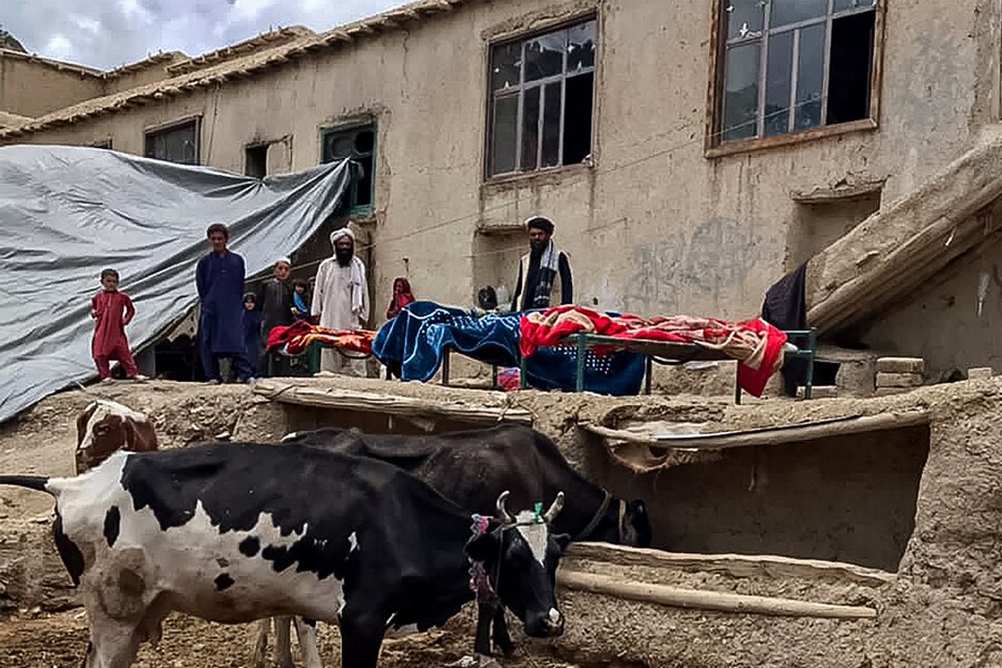 Bodies of Afghan men wrapped in blankets pictured before the burial rituals, who were killed in an earthquake in Gayan district, Paktika province on June 22, 2022. Image: AFP