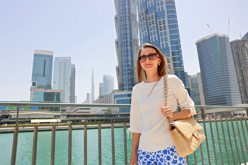 Daria Nevskaya, a partner at Russian law firm poses for a picture in the Gulf emirate of Dubai, on May 24, 2022. As Russia's war in Ukraine drags on, more and more Russian professionals are moving to Dubai, the business-friendly Gulf emirate that offers an escape from the impact of Western sanctions