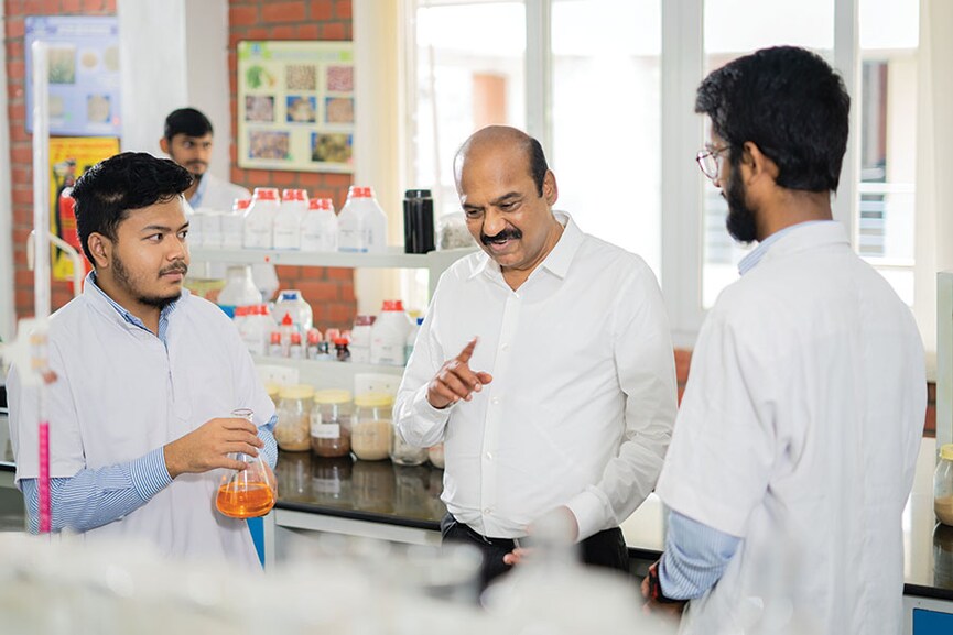 B Soundararajan (centre), who started the Suguna Group in 1984