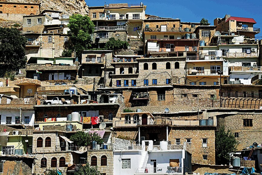 As Iraq's concrete jungle swelters, ancient stone houses stay cool