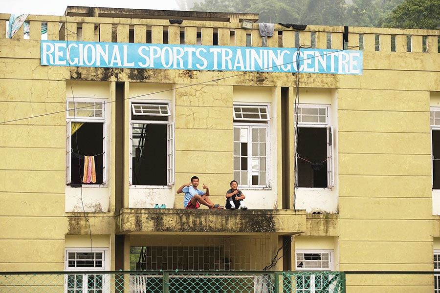 Teenage hostellers relax after a practice session at the Regional Sports Training Centre in Saidan, Kolasib
Image: Mexy Xavier