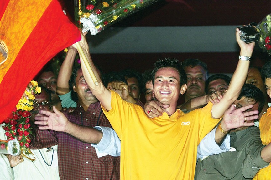 Bhaichung Bhutia after East Bengal won the ASEAN Cup in July 2003. Bhutia holds the distinction of scoring a rare hat-trick in a Mohun Bagan-East Bengal tie