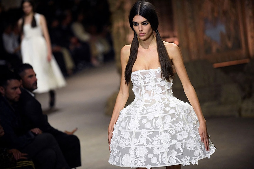 Dior turns heels and corsets into 'ironic power dressing'