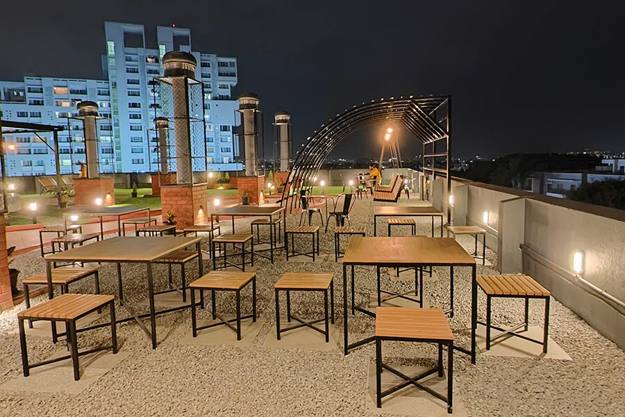 The rooftop area at Zolo Triloha in Bengaluru, which is used for community events like barbeque nights and gatherings.