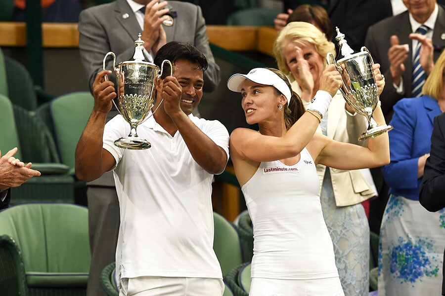 Martina Hingis (right) and Paes have paired up to win four Grand Slam mixed doubles titles in 16 months
Image: Action Images / Tony O'Brien Livepic