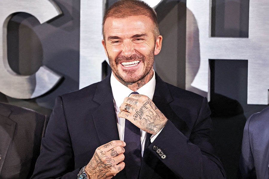 David Beckham; Photo by HENRY NICHOLLS / AFP