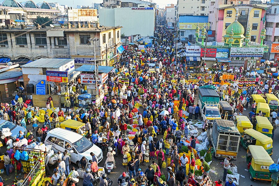 
People crowd at a market in Bangalore, India.
Manjunath KIRAN / AFP