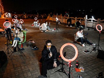 Chinese live streamers flock outdoors to get late-night donations from online 'passer-by'