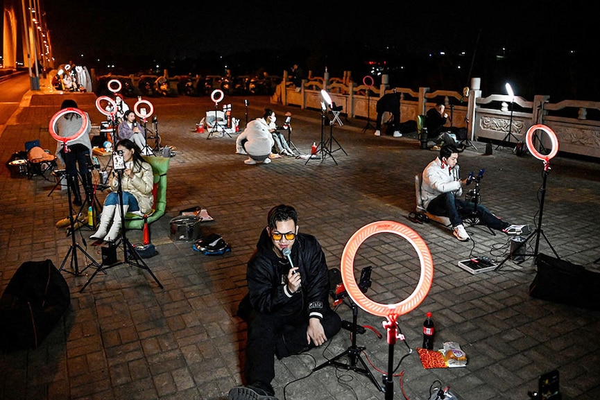 Chinese live streamers flock outdoors to get late-night donations from online 'passer-by'