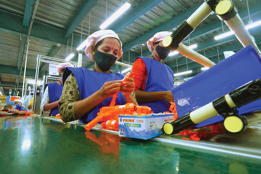 Workers put together a toy on the final assembly line at an Aequs manufacturing unit in Belagavi, Karnataka. Aequs, one of the largest toy exporters in India, has set up operations in one of the largest SEZs being set up in Koppal in the state Image: Courtesy: Aequs