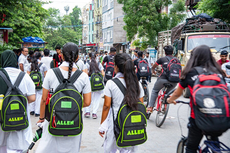 There are thousands who swarm out of the coaching centres of Allen, the biggest coaching player in Kota, in green T-shirts. Then there are black and red T-shirts of PW (PhysicsWallah). 