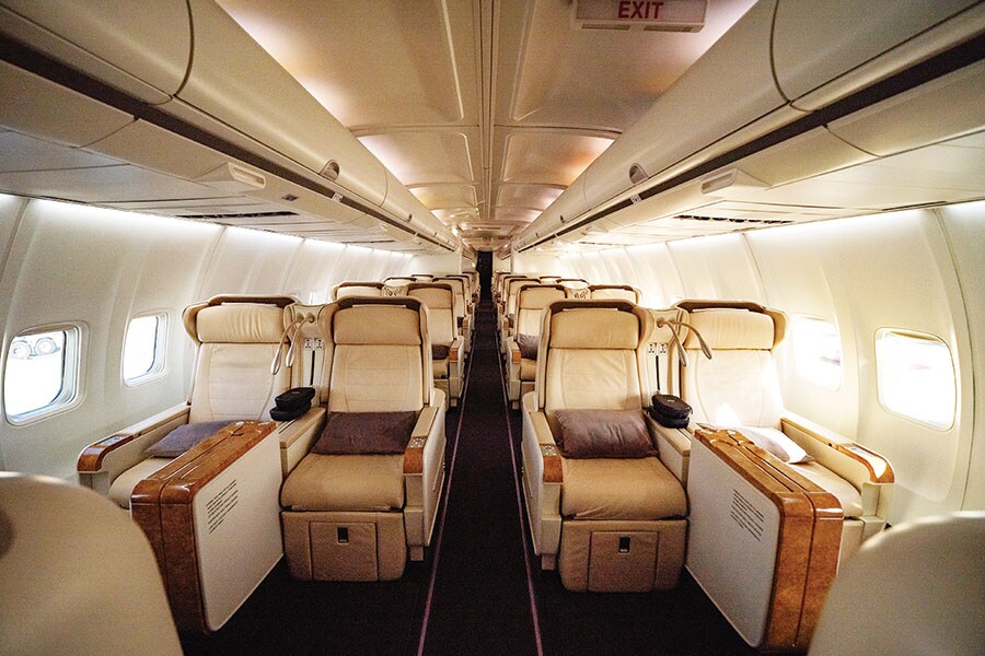 The Boeing 757 has first-class seats that recline into fully lie-flat beds
Image: The Q Experiences