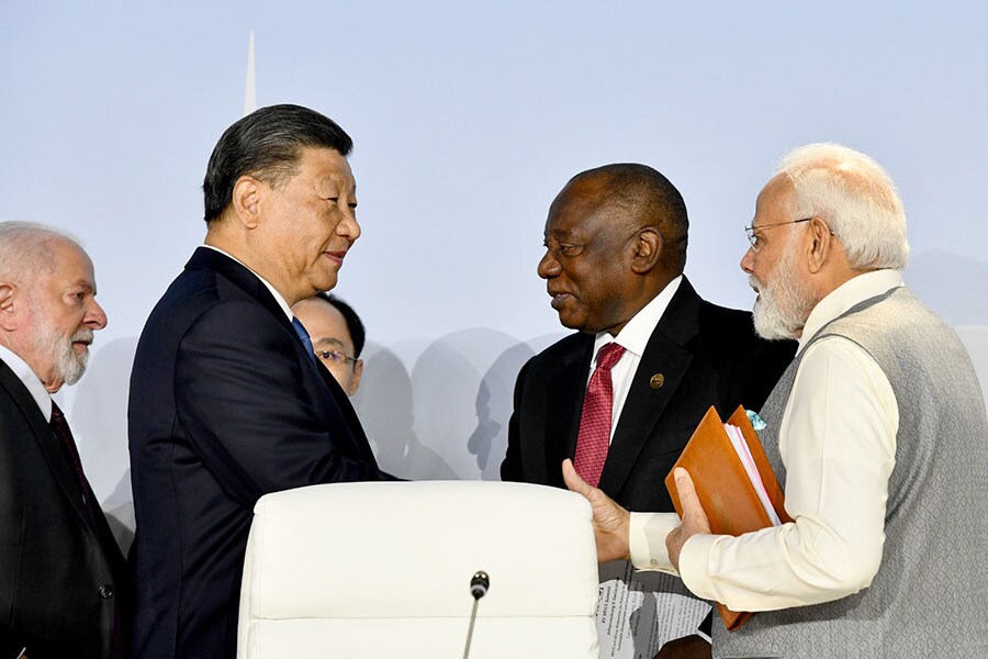 Indian Prime Minister Narendra Modi  and Chinese President Xi Jinping and others meet on the sidelines of 15th BRICS summit in Johannesburg, South Africa, on August 24, 2023.
Image: BRICS/Anadolu via Getty Images