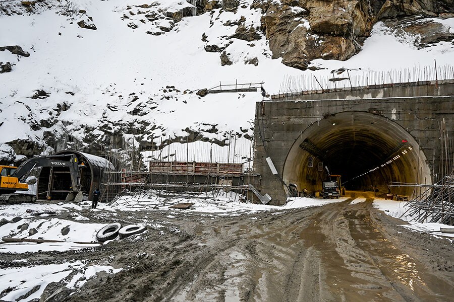 A tunnel under construction at the Sela pass in the Tawang, Arunachal Pradesh, April 2, 2023. Freshly laid roads, bridges, upgraded military camps, and new civilian infrastructure dot the winding high Himalayan route to the Indian frontier village of Zemithang. Image:  Arun Sankar / AFP 