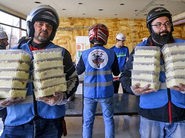 Born to help: Syria bikers deliver Ramadan meals