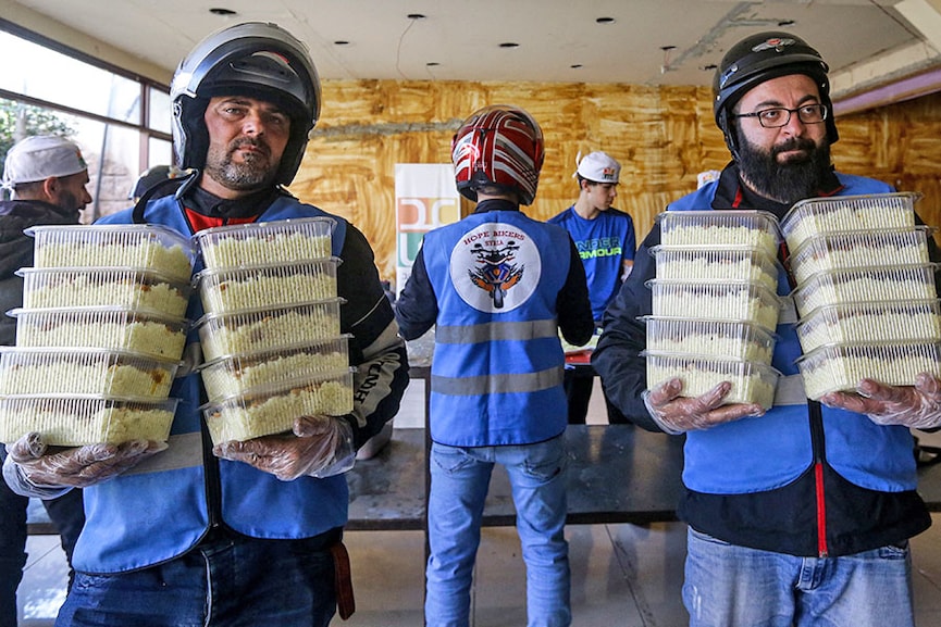 Born to help: Syria bikers deliver Ramadan meals